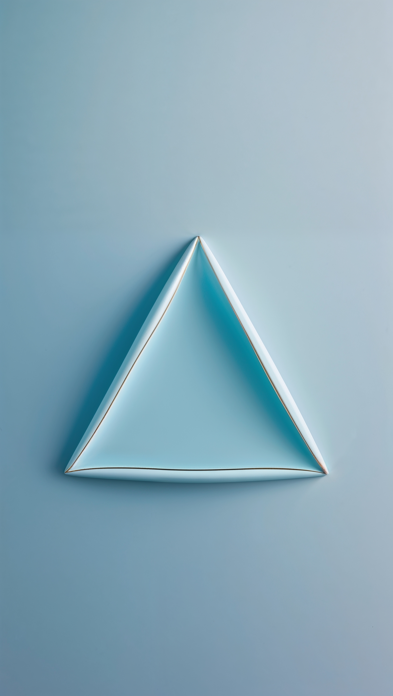 Simple triangle centered on soft sky blue background