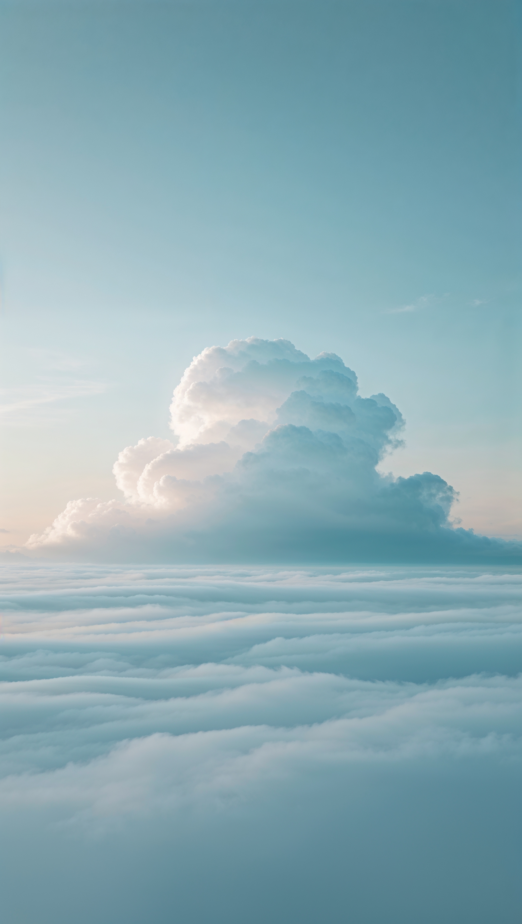 Single cloud in pale blue sky, wide spacing and peace