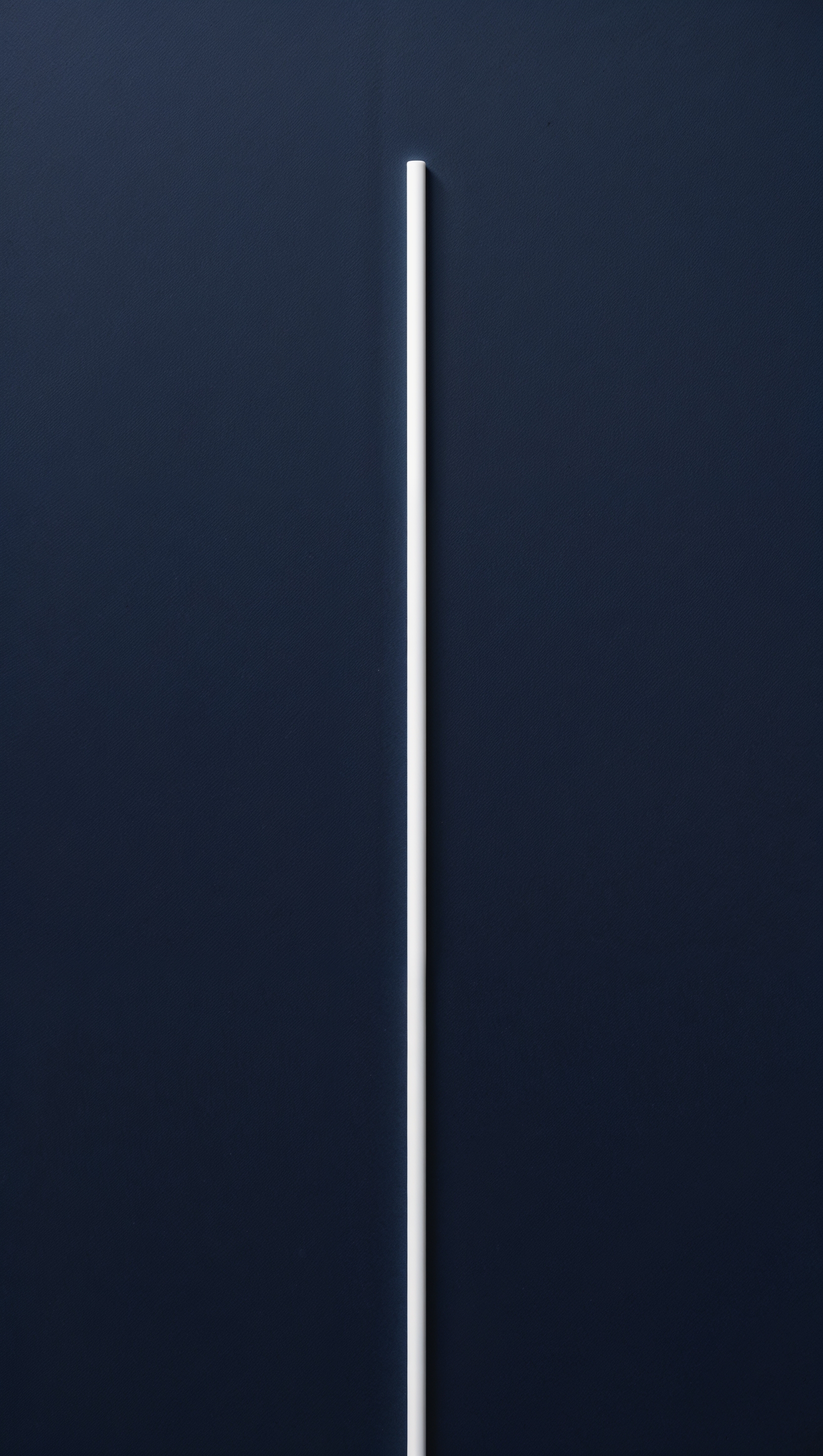 Single thin white vertical line centered on solid navy blue background