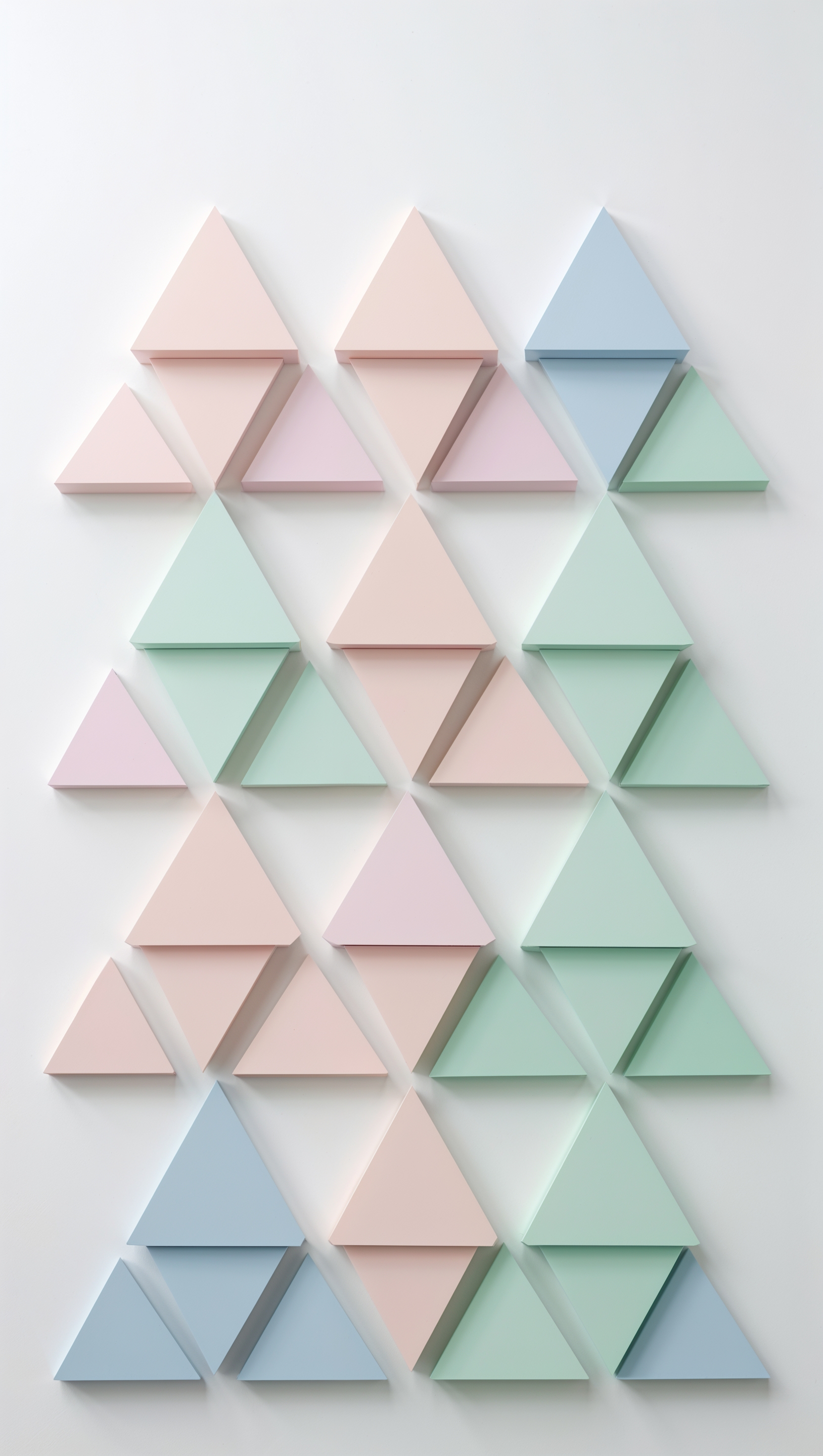 Flat triangles arranged vertically in alternating pastel colors