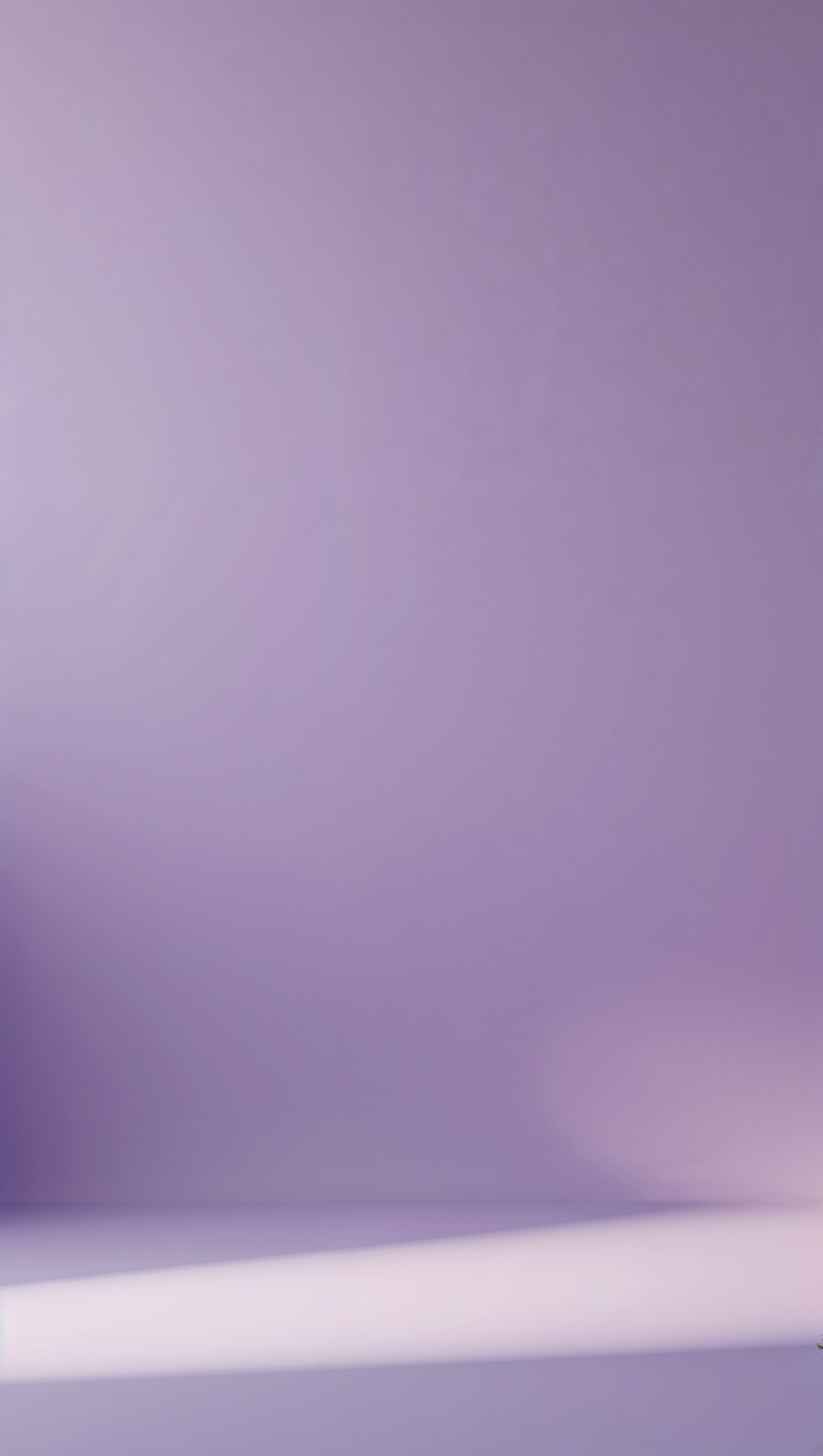 Flat pastel purple color with gentle shadow in bottom right corner