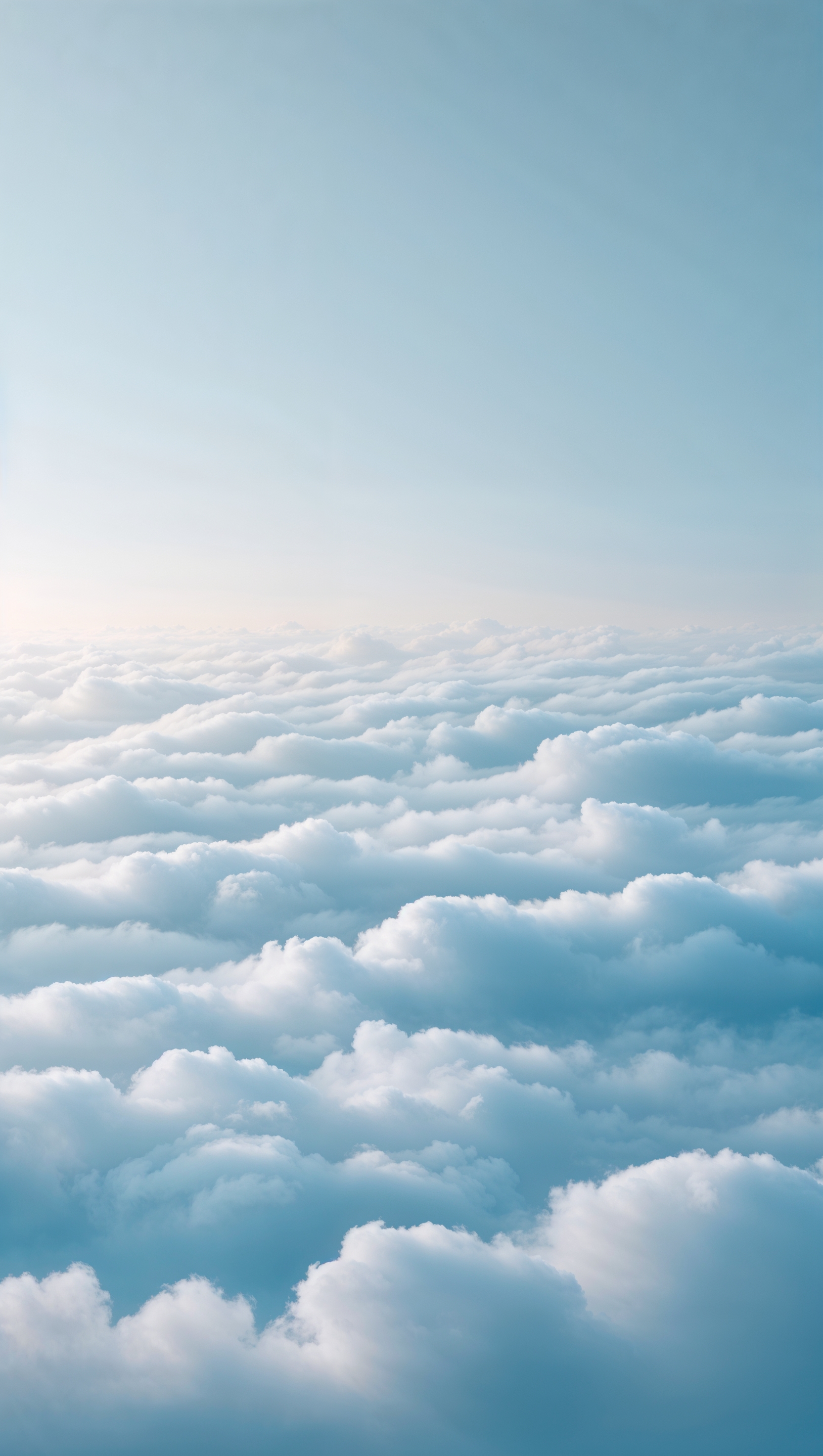 White fluffy clouds on ultra-light blue gradient, smooth and peacefu