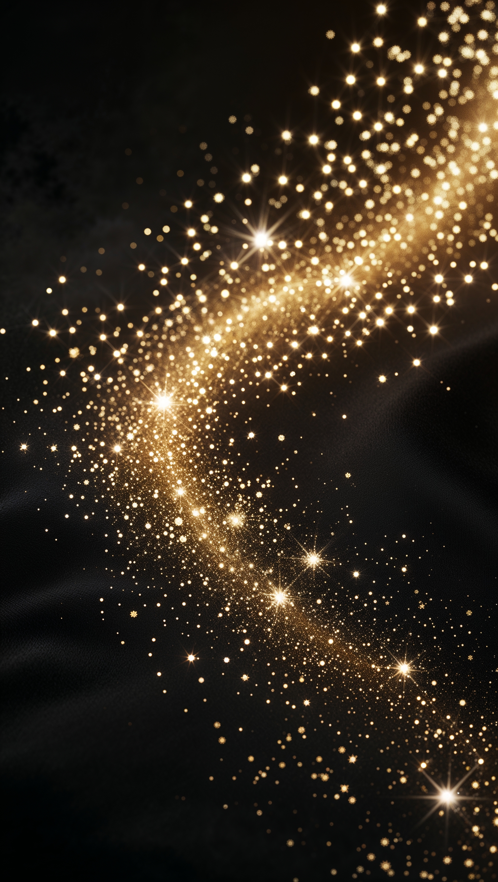 Golden sparkle rain on a dark background with elegant shimmer trail