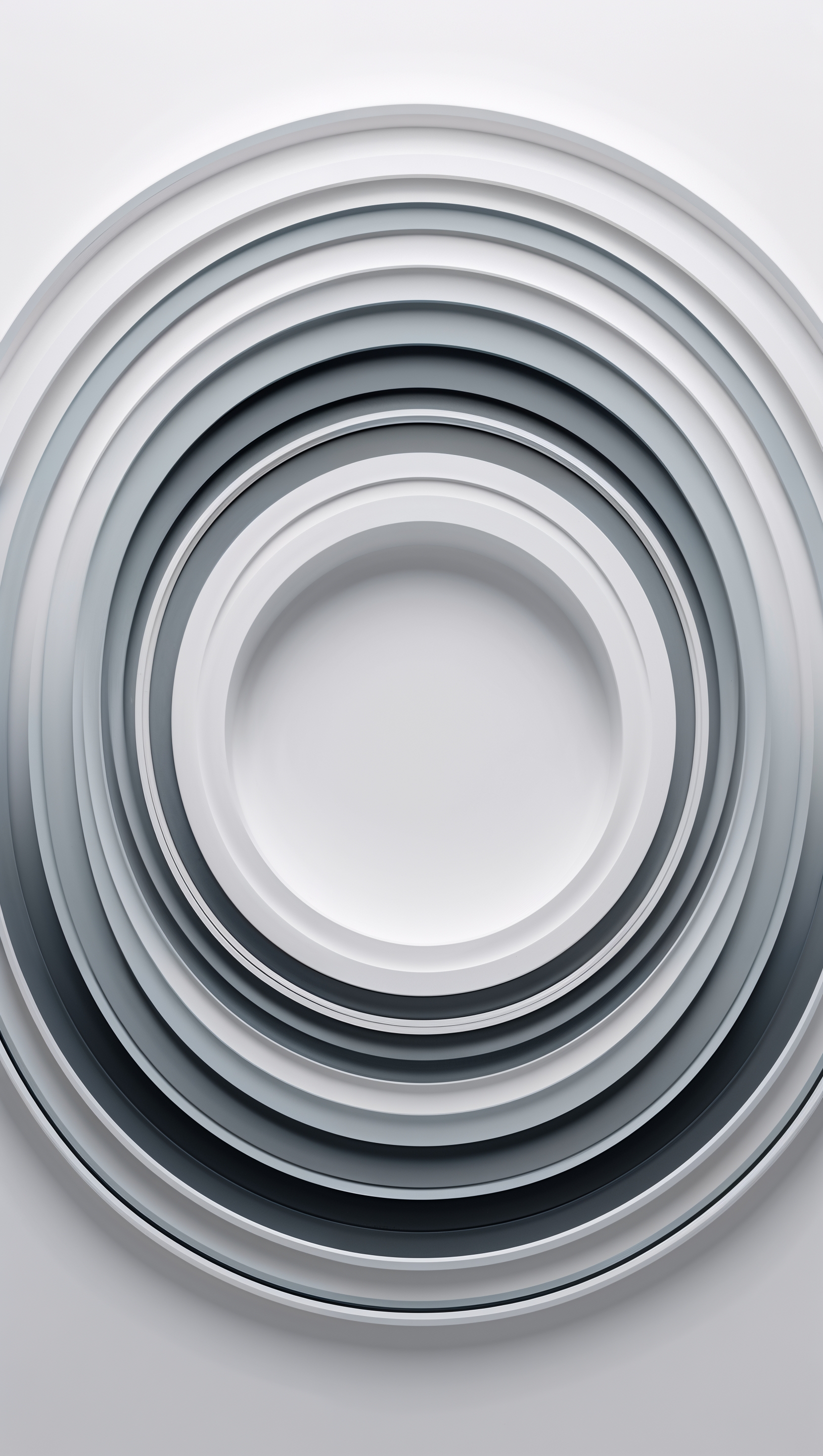Concentric circles in soft gray on white background, modern simplicity