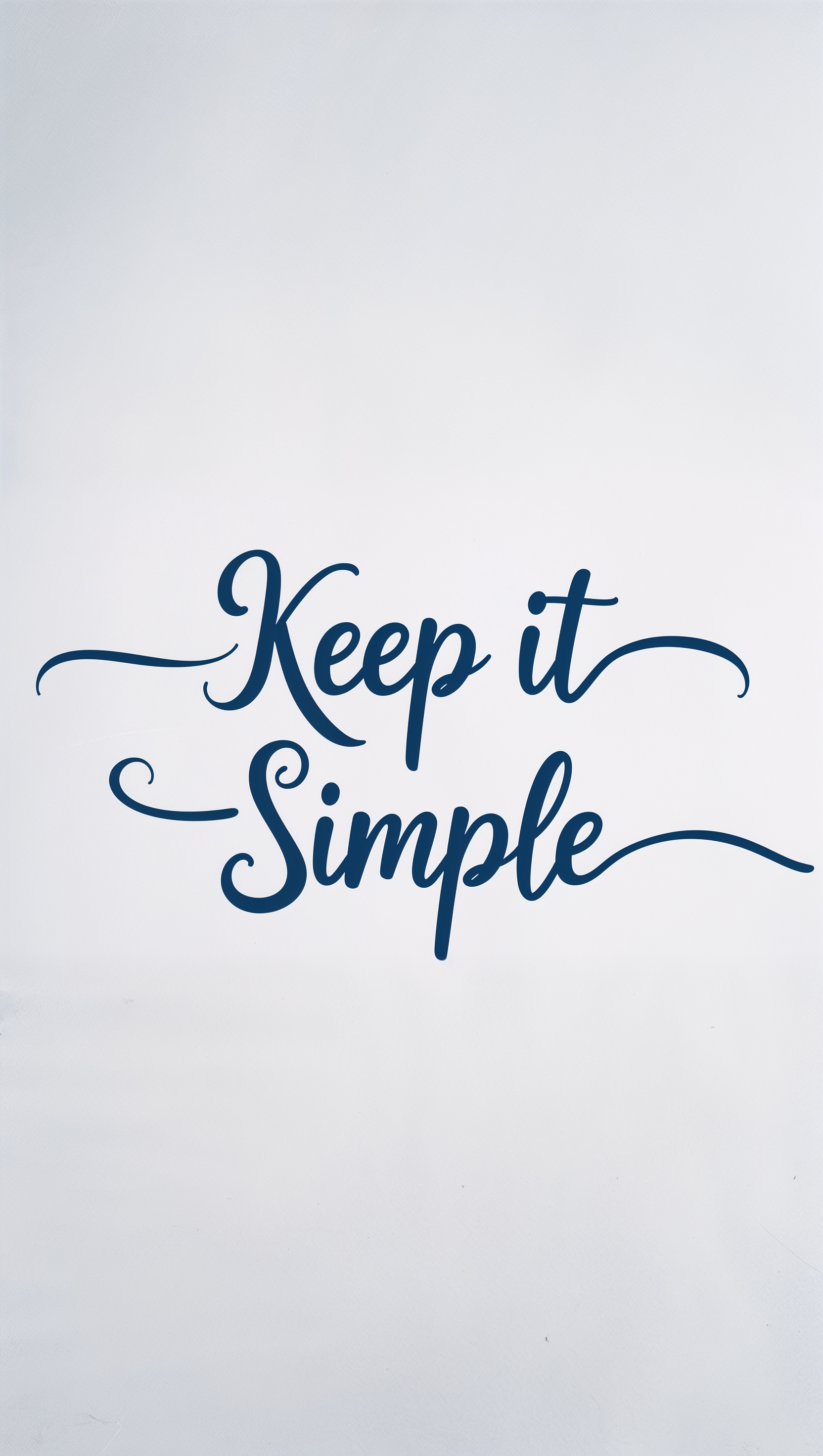 Inspirational quote “keep it simple” in handwritten script on white
