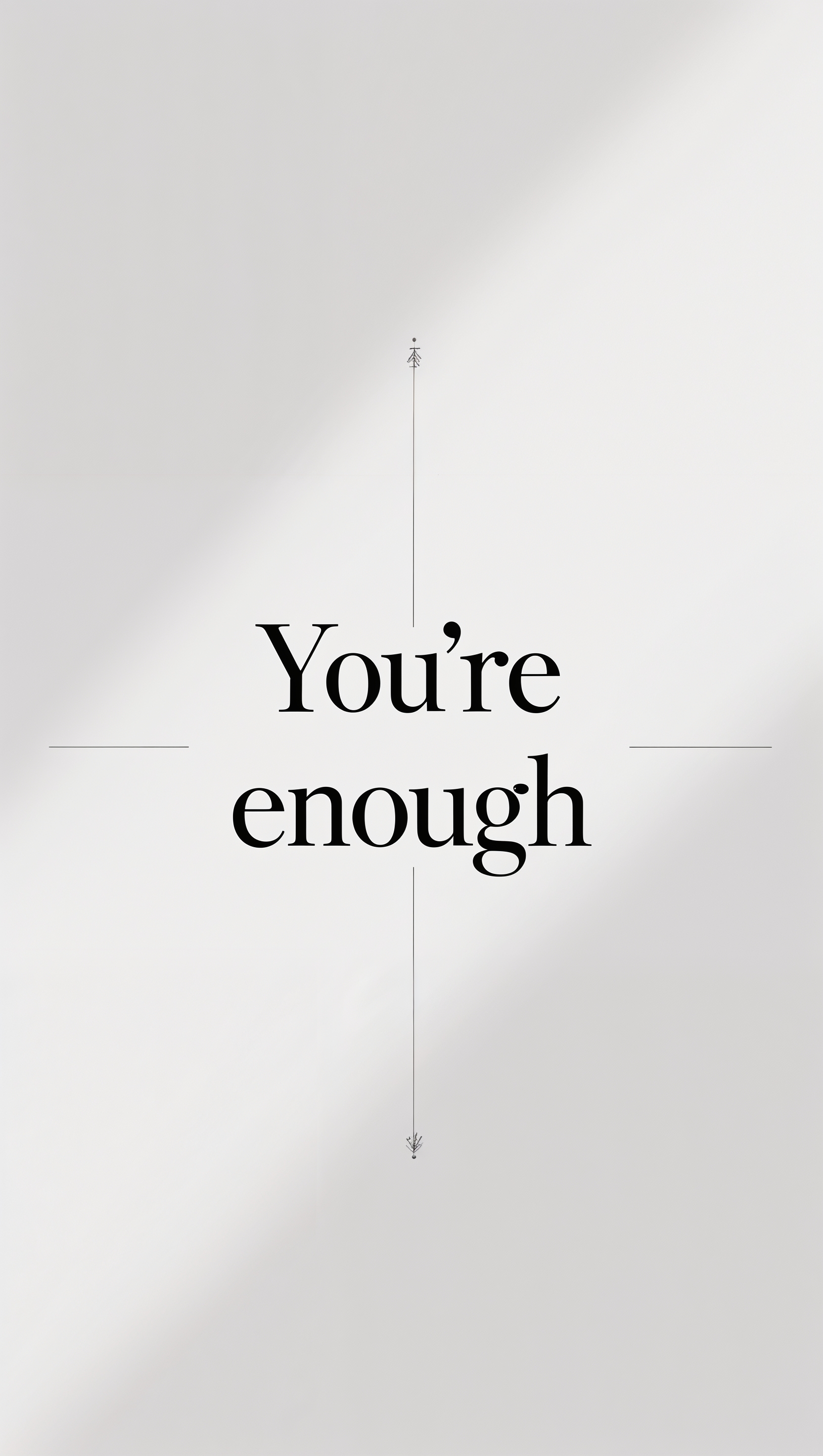 Simple quote “you’re enough” in lowercase serif on blank background