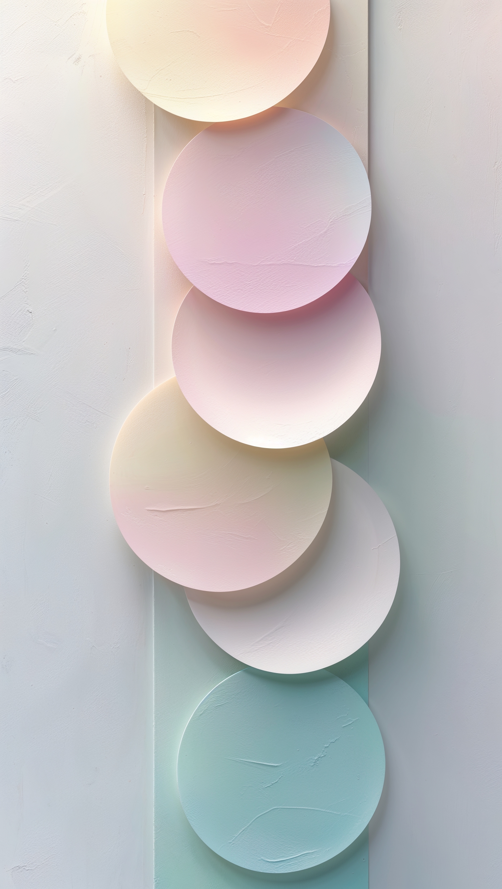 Vertical composition of soft overlapping circles in pastel hues
