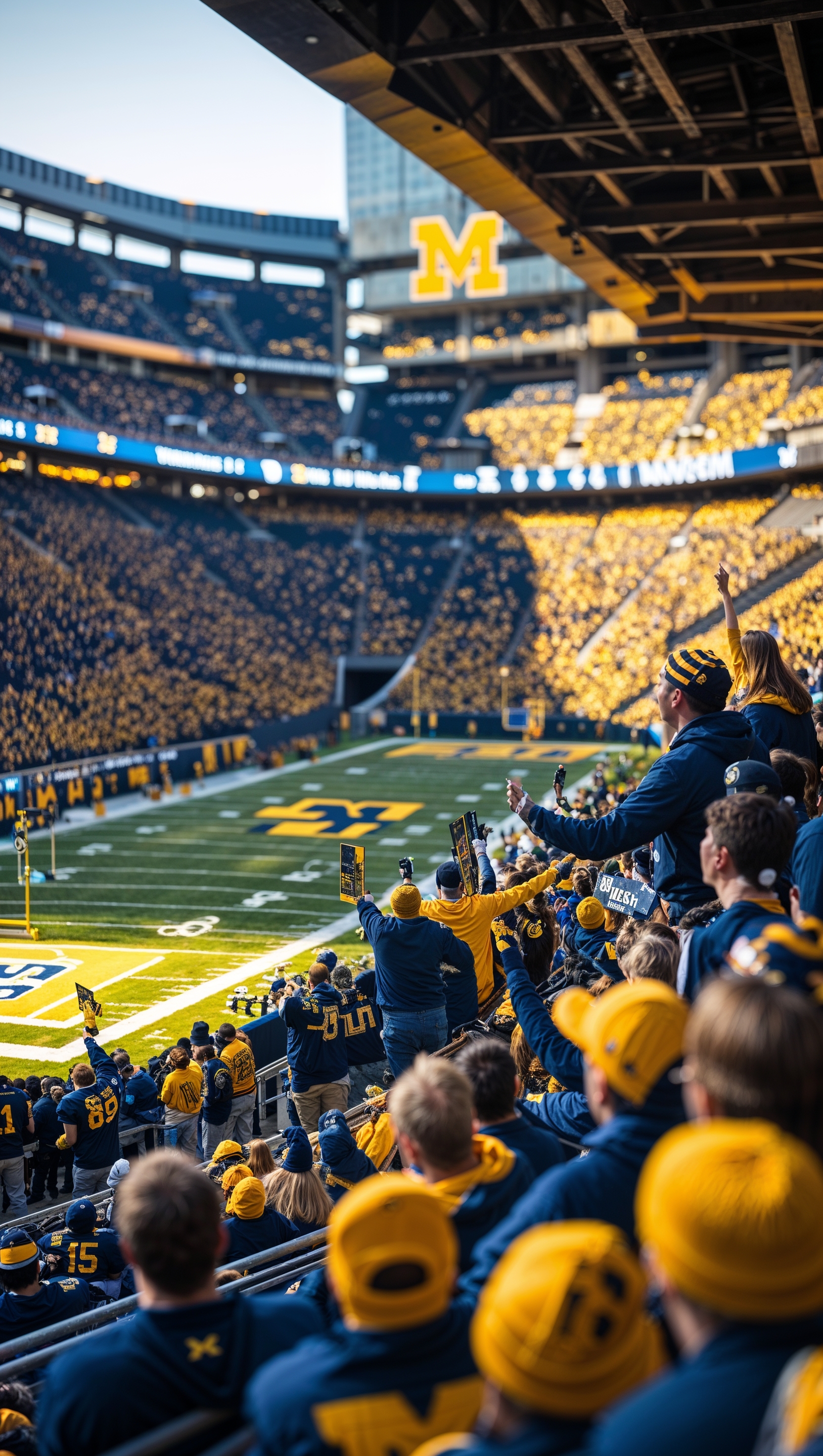 An image of the interior of Michigan stadium with special lighting and fans