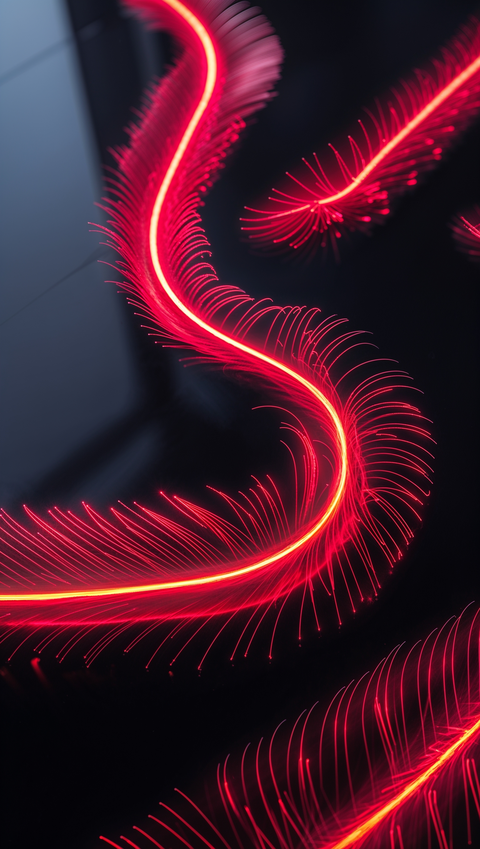 Moving red light trails on a black surface
